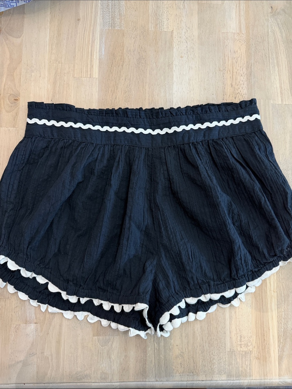 High-Waist Black Women's Shorts with White Scallop Trim lost the tag.